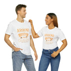 Two models wearing matching white Rock Creek Coffee T-shirts featuring the “Around the Corner From Ordinary” graphic design