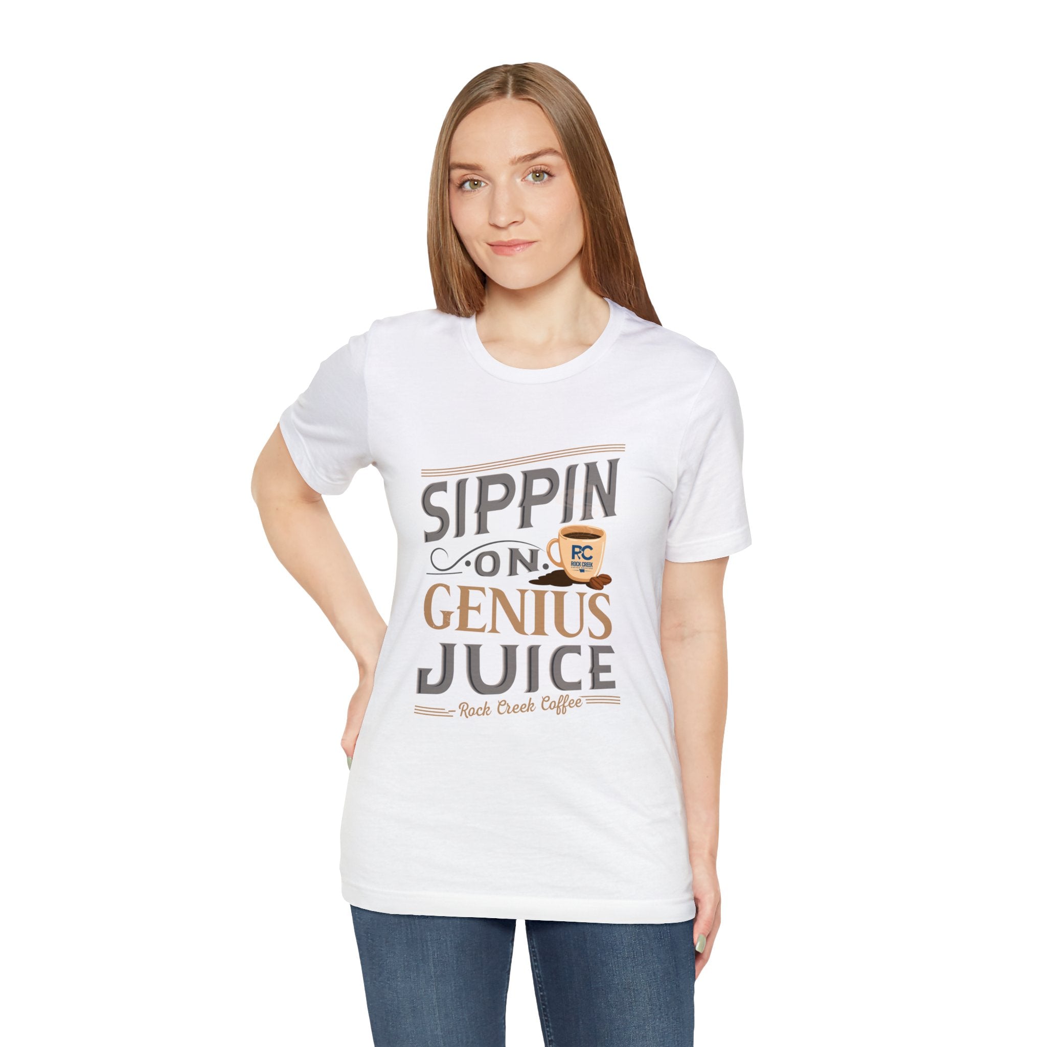 Adult woman modeling a white short-sleeve T-shirt featuring the “Sippin on Genius Juice” graphic in bold coffee-inspired lettering with a small mug illustration, shown against a plain white background.