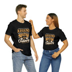 Two models wearing matching black Rock Creek Coffee T-shirts featuring the “Around the Corner From Ordinary” graphic design