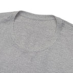 Close-up image of a heather gray crew neck T-shirt showing the collar and upper shoulder area, with the front graphic cropped out of view, displayed against a plain white background.