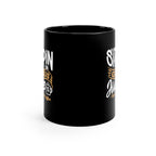 Black ceramic coffee mug shown from the back side with partial “Sippin on Genius Juice Rock Creek Coffee” design visible on both edges against a clean white background.