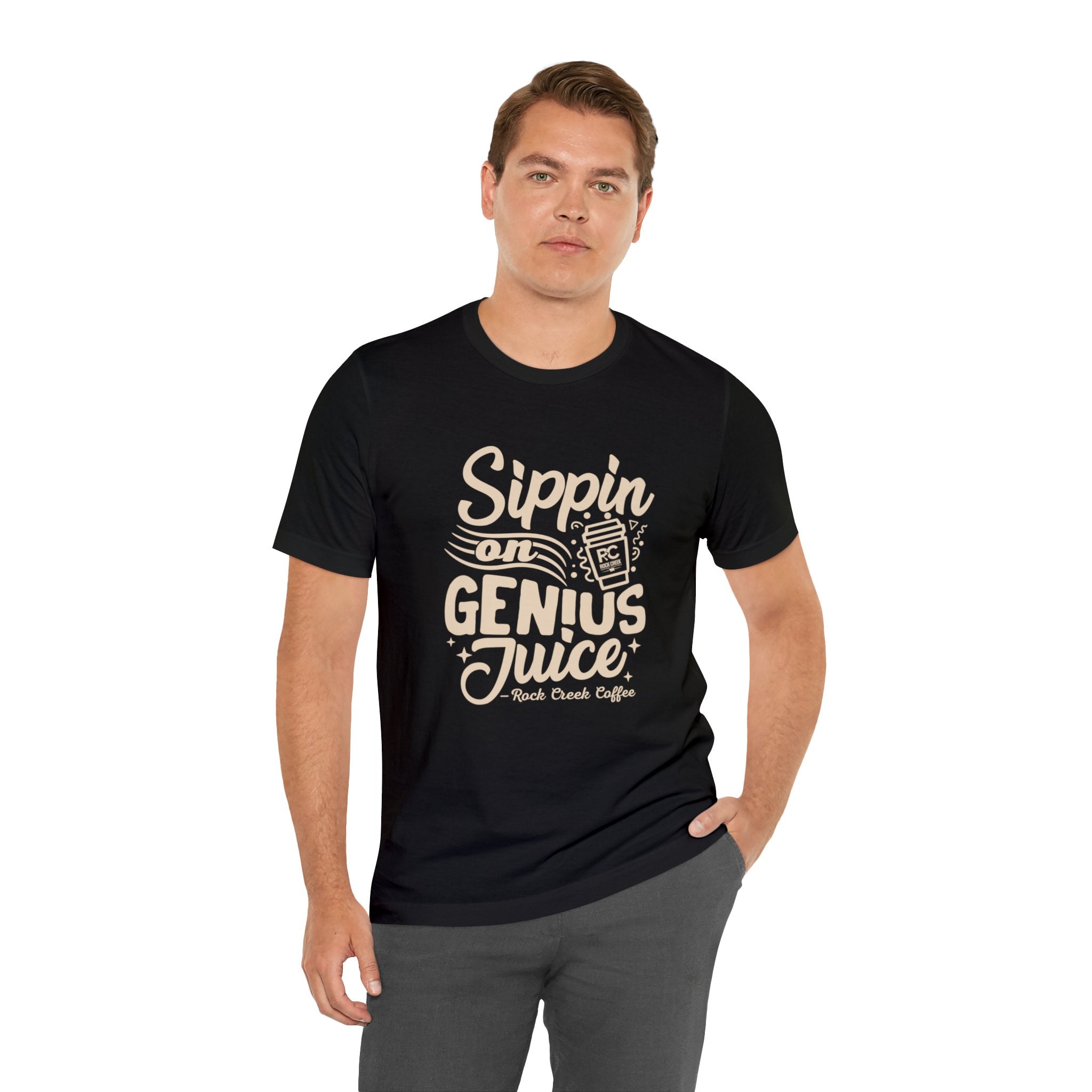 Adult man modeling a black short-sleeve T-shirt printed with the slogan “Sippin on Genius Juice” and a stylized coffee to-go cup graphic on the front, shown against a white background.