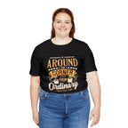 Plus-size female model wearing a black Rock Creek Coffee T-shirt featuring the “Around the Corner From Ordinary” graphic print