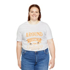 Plus-size female model wearing an ash Rock Creek Coffee T-shirt featuring the “Around the Corner From Ordinary” graphic print