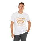 Male model wearing a white Rock Creek Coffee T-shirt featuring the “Around the Corner From Ordinary” graphic print