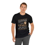 Adult man modeling a black short-sleeve T-shirt with the “Sippin on Genius Juice” graphic printed across the chest in bold coffee-inspired lettering, shown against a plain white background.