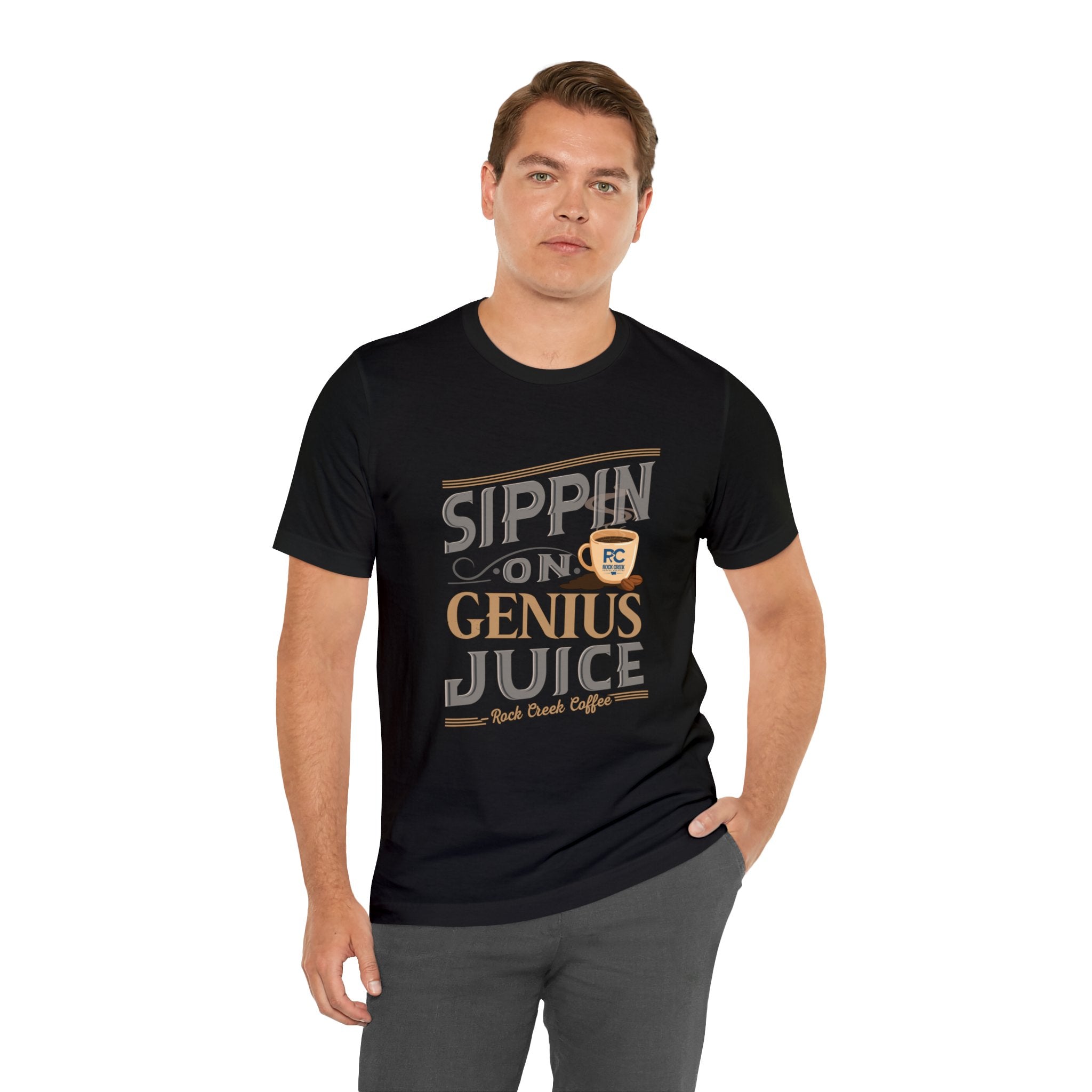 Adult man modeling a black short-sleeve T-shirt with the “Sippin on Genius Juice” graphic printed across the chest in bold coffee-inspired lettering, shown against a plain white background.