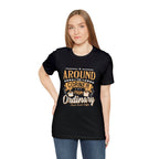 Female model wearing a black Rock Creek Coffee T-shirt featuring the “Around the Corner From Ordinary” graphic print