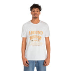 Male model wearing an ash Rock Creek Coffee T-shirt featuring the “Around the Corner From Ordinary” graphic print
