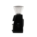 Side view of the black Baratza Encore ESP coffee grinder with a clear bean hopper and dosing cup, displayed against a white background.