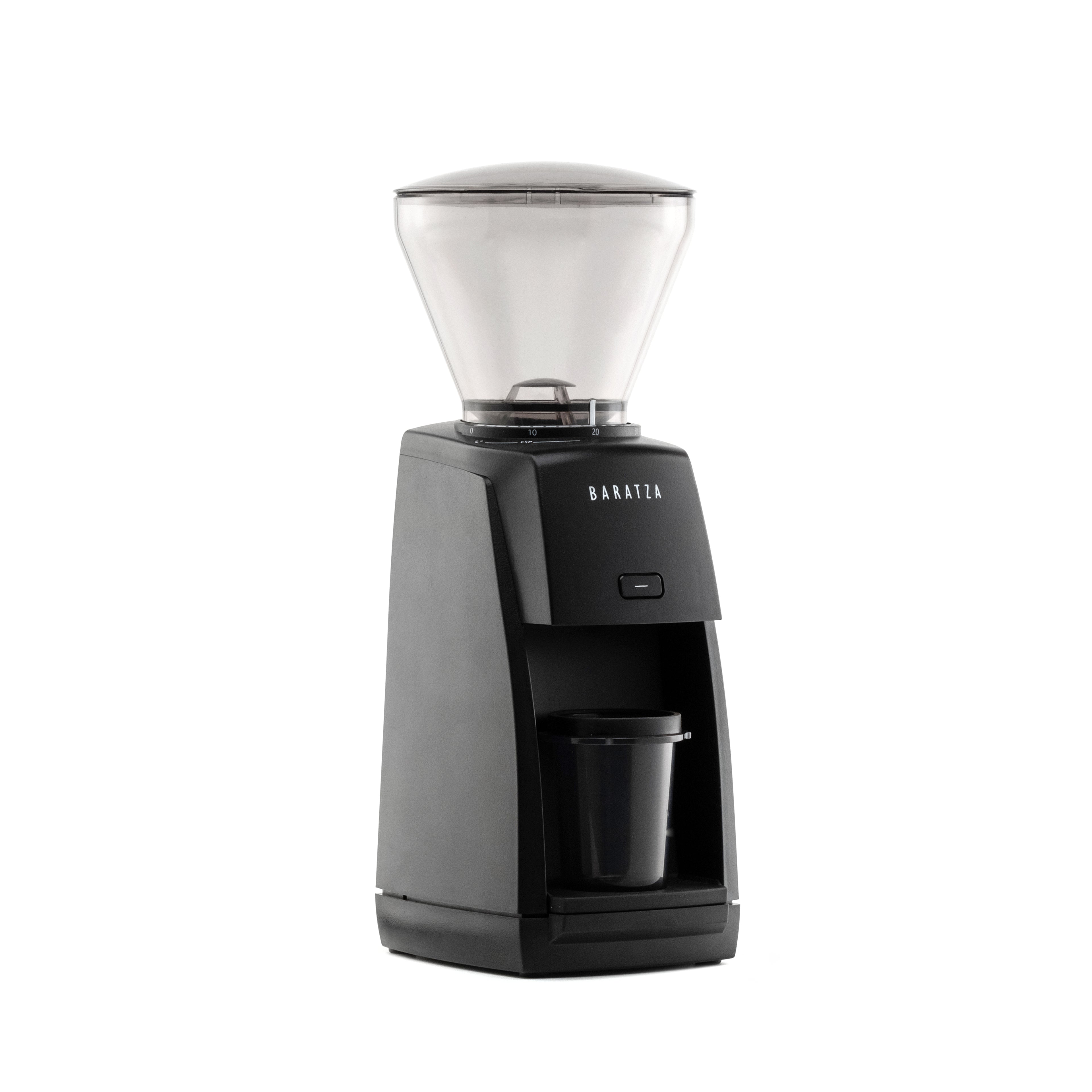 Three-quarter right view of the black Baratza Encore ESP coffee grinder with clear bean hopper and included dosing cup, displayed against a white background.