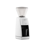 Three-quarter right view of the white Baratza Encore ESP coffee grinder with clear bean hopper and included dosing cup, displayed against a white background.