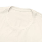 Close-up product image of a cream crew neck T-shirt showing the neckline and upper chest area, with no visible graphic in frame, displayed against a plain white background.