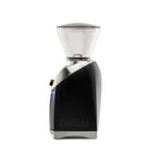 Side view of a Baratza Virtuoso Plus coffee grinder in black with stainless steel accents and clear bean hopper, displayed against a white background.