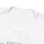 Close-up detail of a white crew neck T-shirt showing the neckline and upper chest area, with the top edge of the “Fueled by Coffee and Dad Jokes” graphic partially visible against a plain white background.