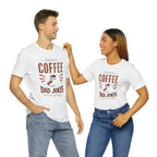 Adult man and woman modeling matching white short-sleeve T-shirts featuring the “Fueled by Coffee and Dad Jokes” graphic with a coffee cup illustration and Rock Creek Coffee text, posed together against a plain white background.