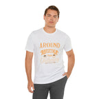 Male model wearing an ash Rock Creek Coffee T-shirt featuring the “Around the Corner From Ordinary” graphic print
