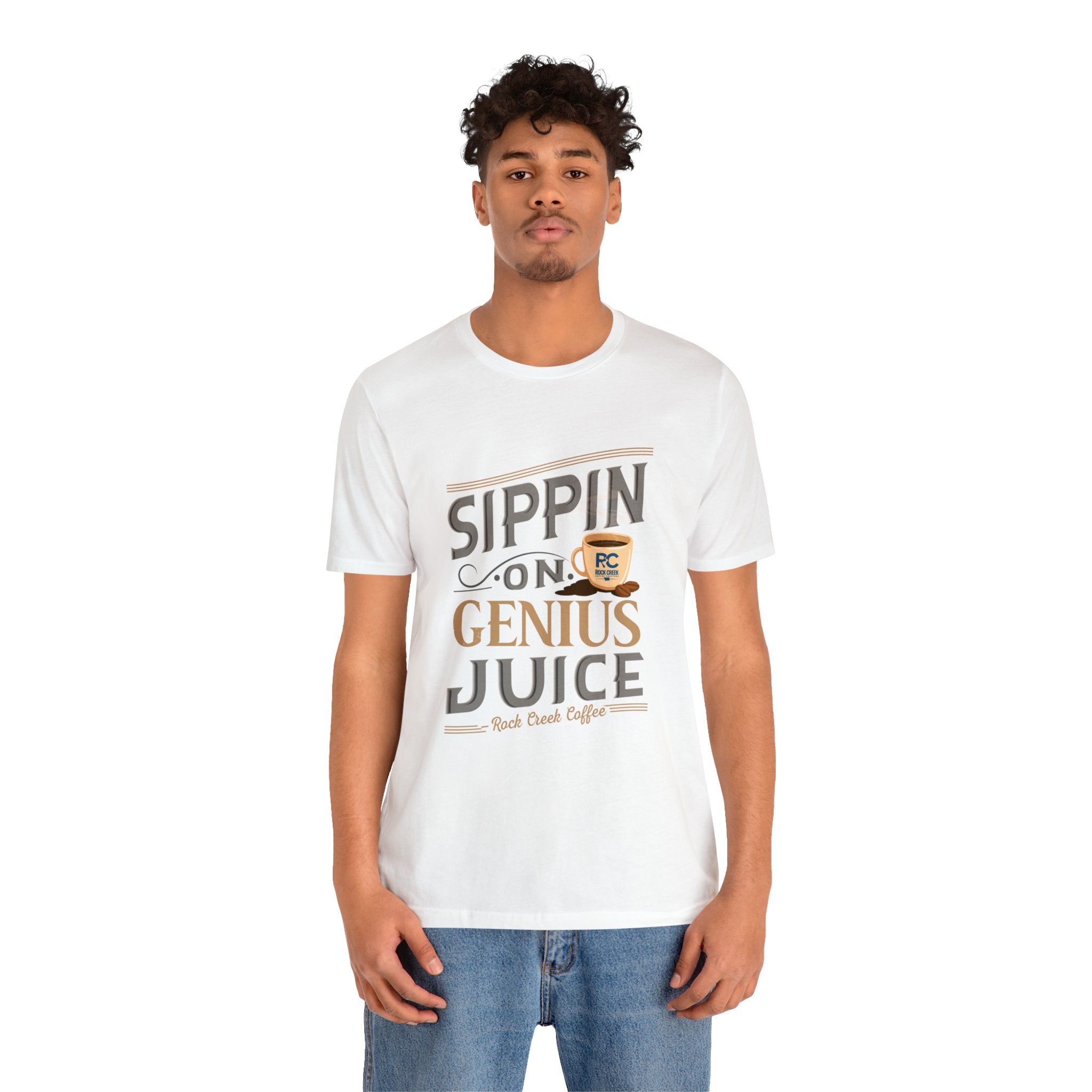 Adult man modeling a white short-sleeve T-shirt featuring the “Sippin on Genius Juice” graphic in bold coffee-inspired lettering with a small mug illustration, shown against a plain white background.
