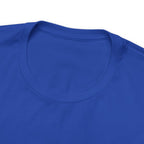Close-up detail of a royal blue crew neck T-shirt showing the neckline and upper chest area, with the front graphic cropped out of view, displayed against a plain white background.
