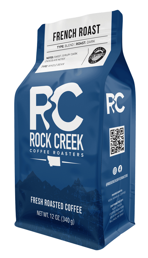 Rock Creek Coffee Roasters French Roast dark roast whole bean coffee in a 12 oz blue bag, featuring sweet, syrupy dark chocolate notes, isolated on a white background.