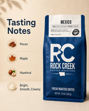 Load image into Gallery viewer, Rock Creek Coffee Roasters Mexico coffee bag shown with a clean tasting notes graphic highlighting pecan, maple, hazelnut, and bright, smooth, creamy flavor notes.